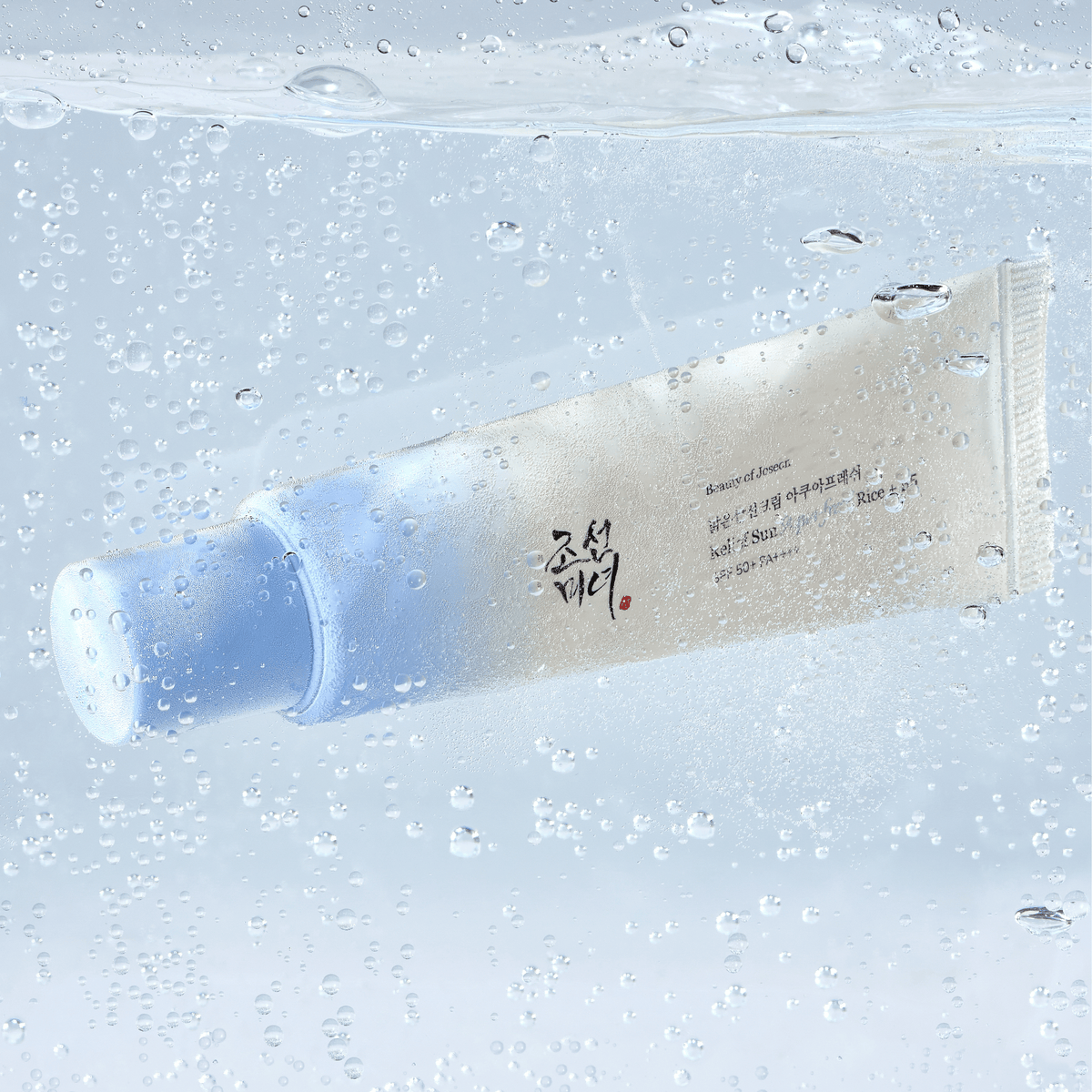 a tube of cream in water
