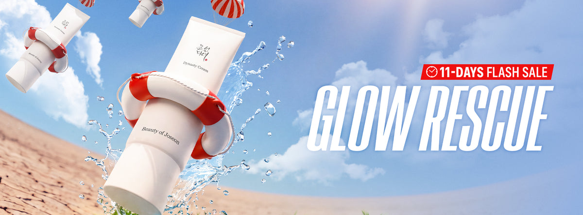 a white tube with red and white objects on it and a red and white ball in the air