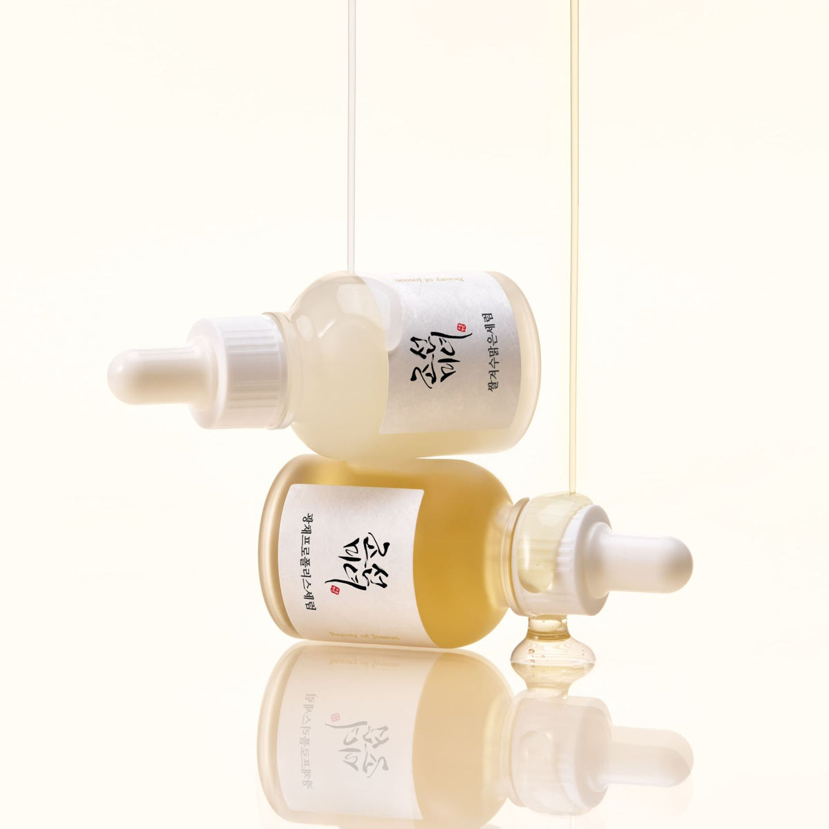 a group of bottles with liquid dripping