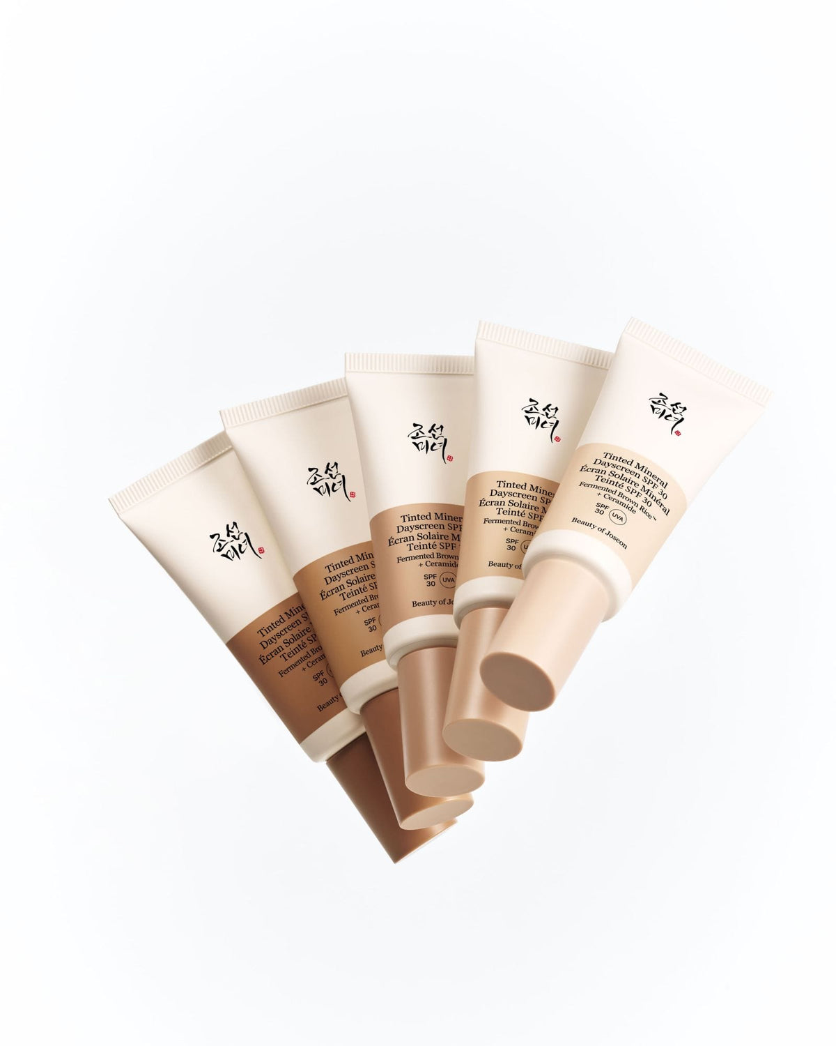 a group of cream containers
