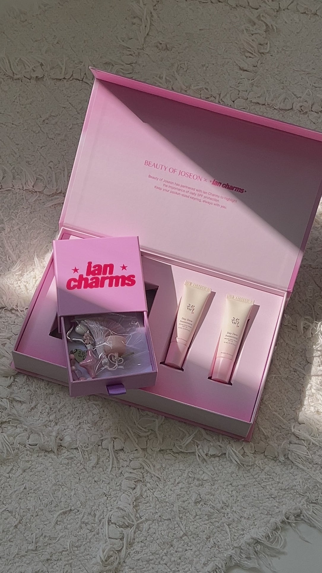 Day Dew Sunscreen set with ian charms - video background